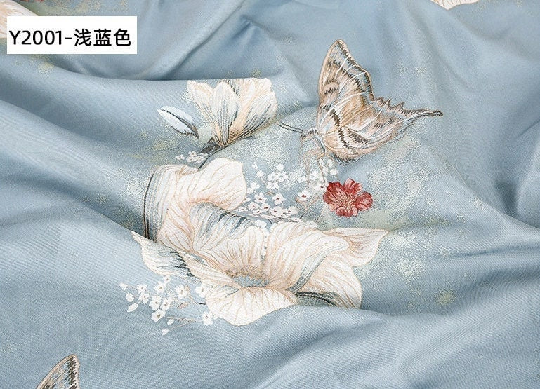 Tissu jacquard papillon : 145 cm de large, polyester, matériau de couture