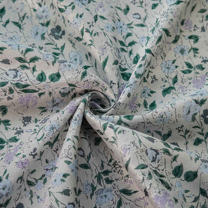 Tissu jacquard à motif floral : polyester texturé 3D, largeur 142 cm