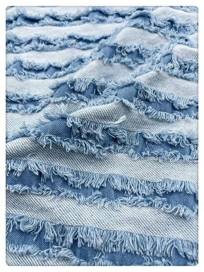 Tissu denim déchiré : coton rayé 3D à bords francs (150 cm)