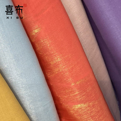 Tissu soyeux brillant et glacé : effet dégradé scintillant, largeur 147 cm, vendu au mètre