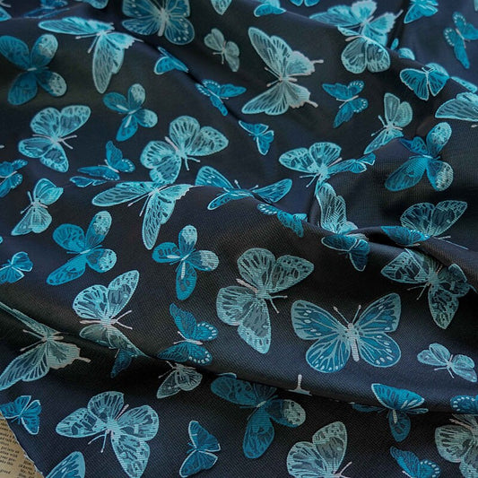 Tissu jacquard papillon : polyester pour ameublement, costumes et décoration - 162,5 cm de large