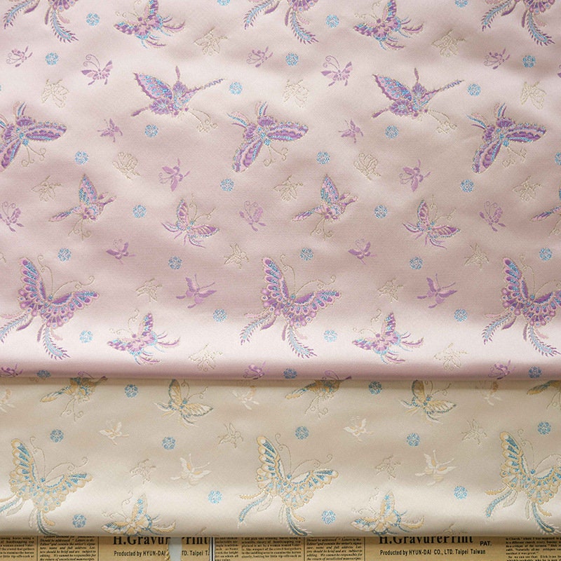 Tissu Butterfly Gold Thread : 150 cm de large, polyester tissé orné