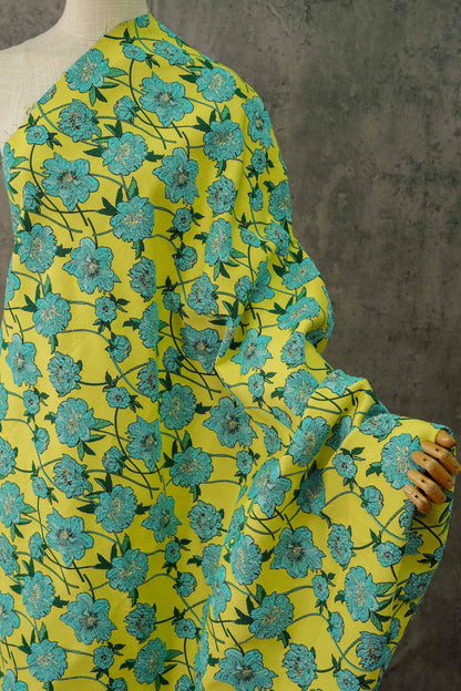 Tissu jacquard réversible : motif floral 3D bleu et jaune, largeur 135 cm