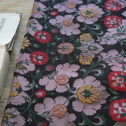 Tissu jacquard à motif floral : polyester texturé 3D, largeur 142 cm