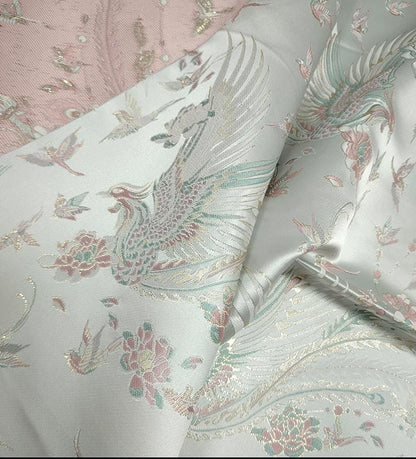 Tissu jacquard Queue de Phénix : motif fil doré 3D, 150 cm de large
