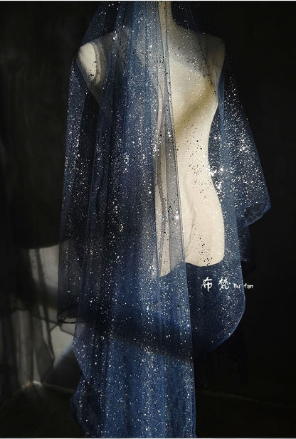 Tissu organza Space Galaxy : paillettes bronzées, 150 cm de large
