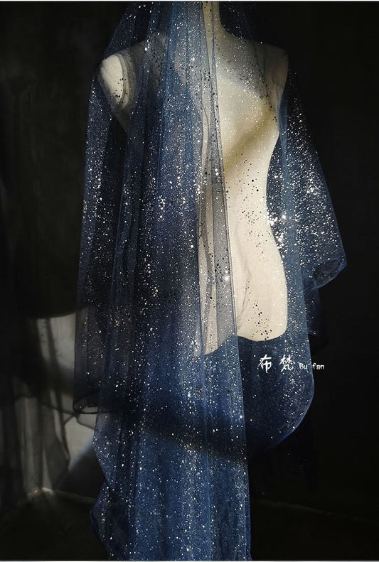 Tissu organza Space Galaxy : paillettes bronzées, 150 cm de large