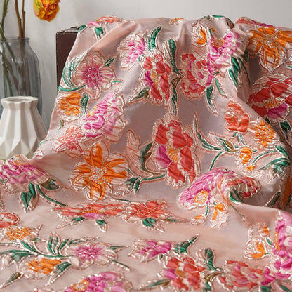 Tissu jacquard à motifs floraux : Matière pour robe de soirée à effet métallisé 3D coloré