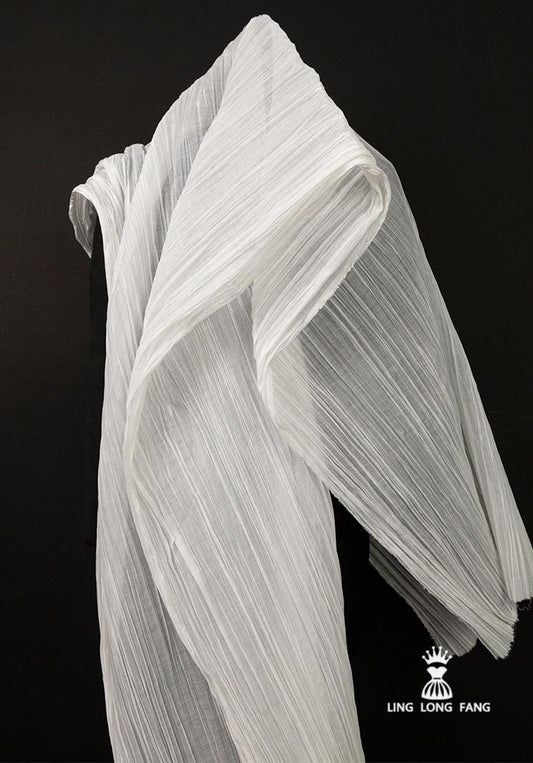 Tissu plissé texturé blanc : Matière légère pour robes 3D - 150 cm de large