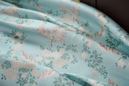 Tissu jacquard à motif floral : Lurex brillant tissé à motif floral 3D, 165 cm de large