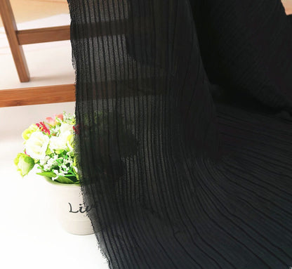Tissu mousseline plissé : 150 cm de large, texture accordéon, drapé fluide