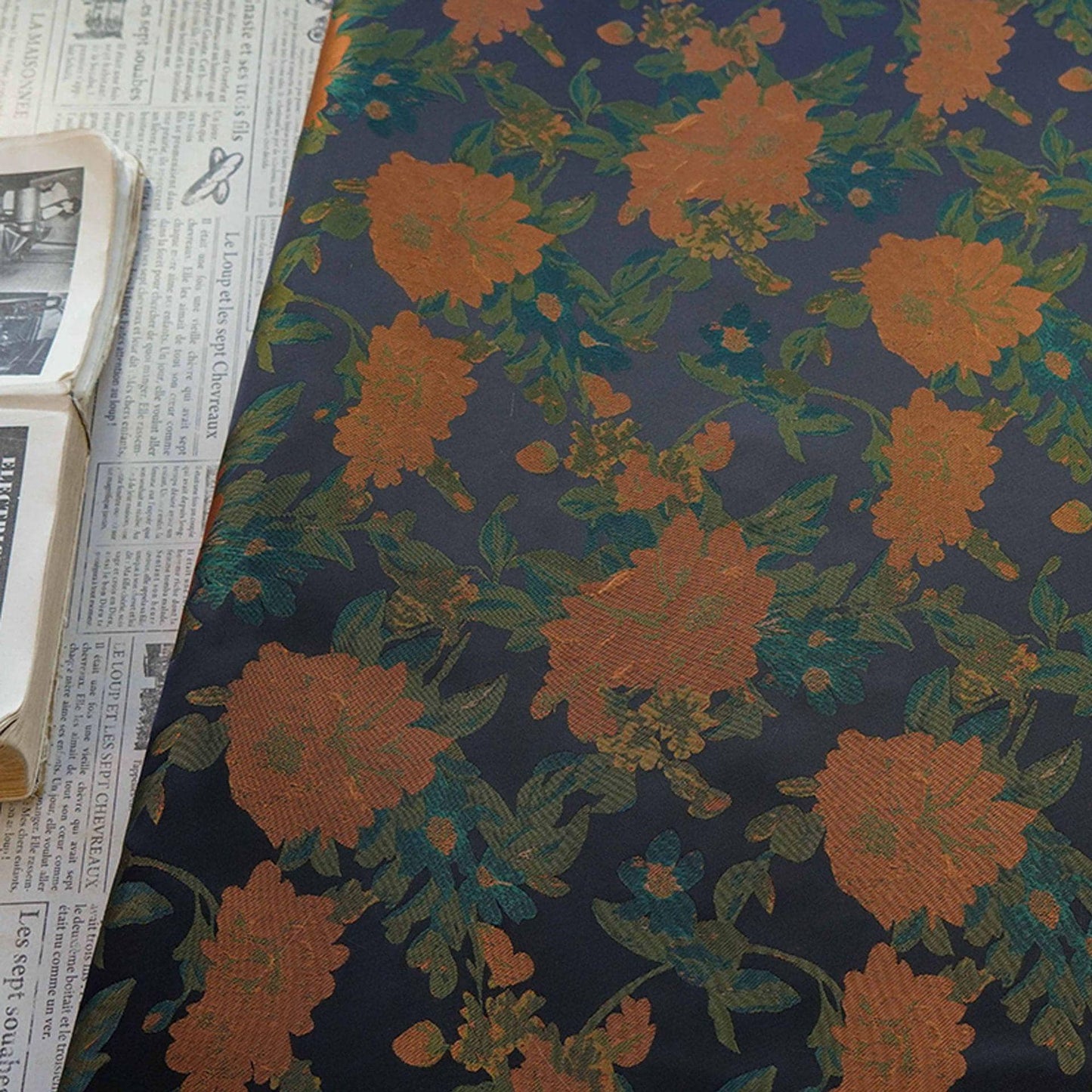 Orange Floral Woven Fabric, Black Polyester Blend, 62" Wide