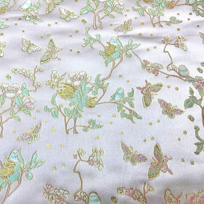 Tissu brocart papillon : Jacquard prune argenté, 150 cm de large