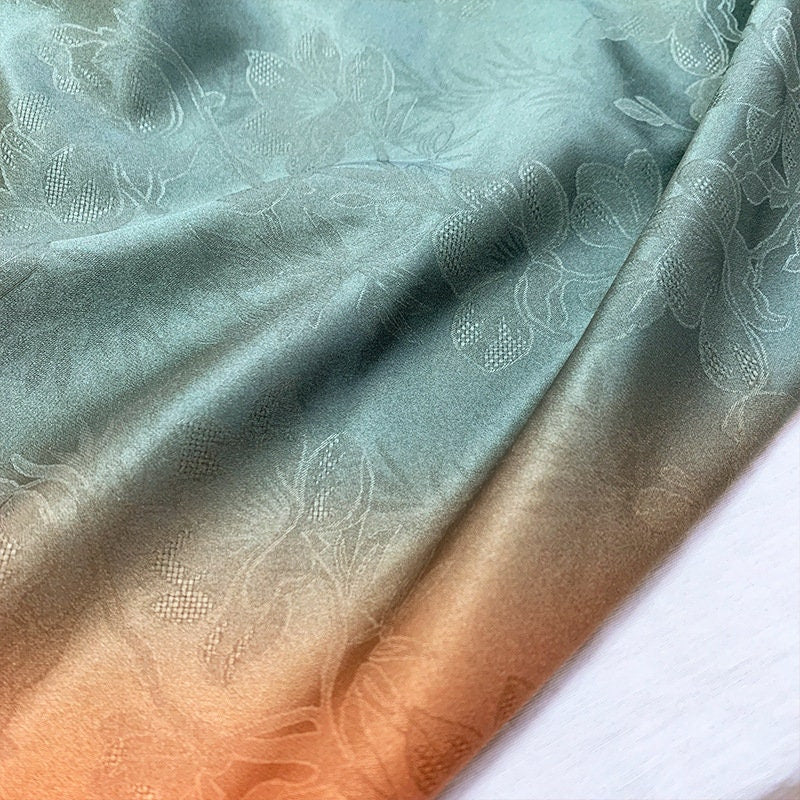 Tissu à imprimé floral dégradé : mélange de polyester et d’élasthanne, largeur 140 cm