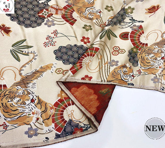 Tissu brocart tigre : broderie 3D, éventails du zodiaque, 150 cm de large