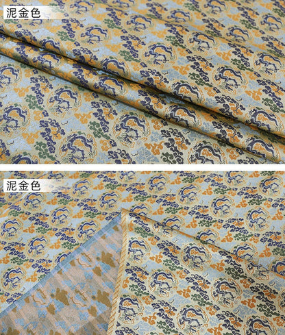 Tissu brocart Dragon Argenté : mélange de rayonne de 150 cm de large, pour la confection de cheongsams.