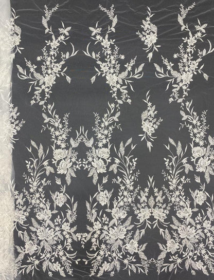 Tissu à sequins brodé de fleurs : rayonne de 124 cm de large pour la confection de vêtements