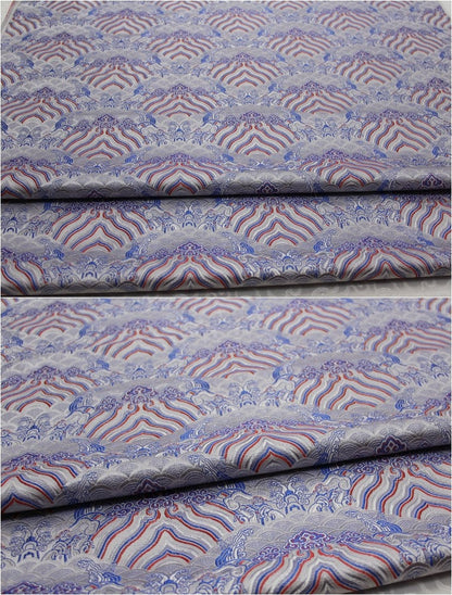 Tissu brocart de soie et rayonne à motif vagues océaniques - 75 cm