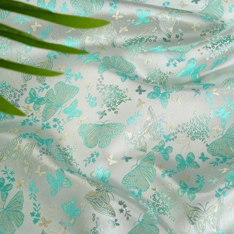 Tissu brocart de soie vert turquoise : jacquard à motifs floraux papillons, 147 cm de large