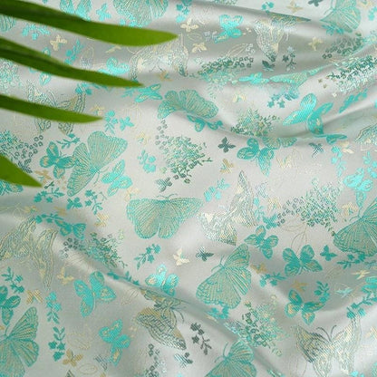 Tissu brocart de soie vert turquoise : jacquard à motifs floraux papillons, 147 cm de large