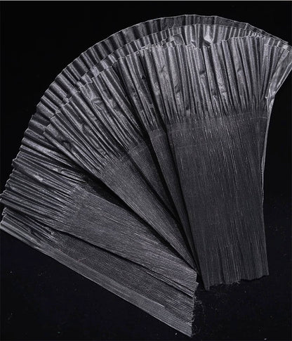 Dentelle organza à lustre métallique : tissu de créateur à volants 3D