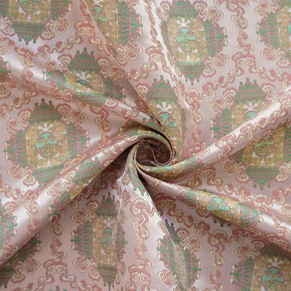 Tissu brocart Wishful : mélange soie-rayonne de 150 cm de large, pour la confection de cheongsams.