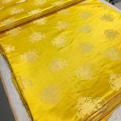 Tissu brocart or brillant vintage : jacquard de soie et rayonne (largeur 75 cm)