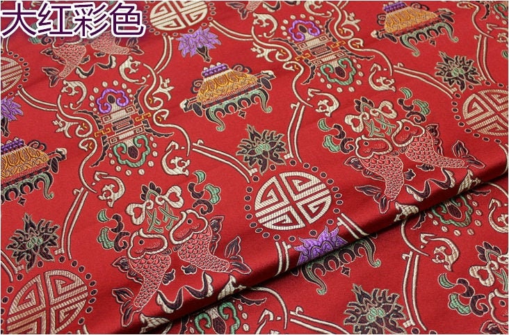 Brocart rouge chinois : motif double poisson Poissons