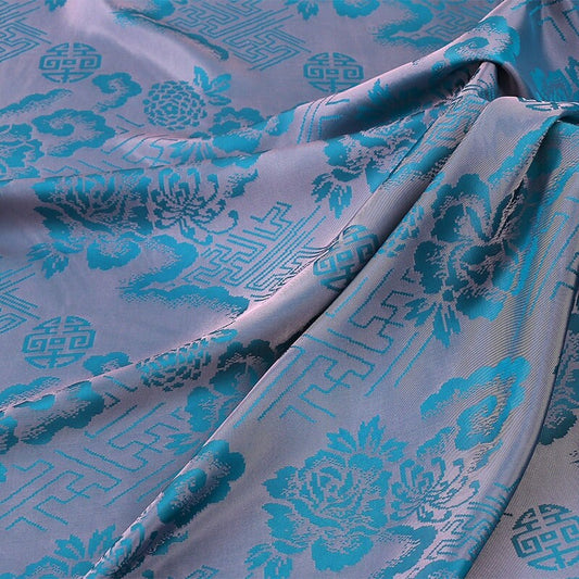 Tissu jacquard en rayonne à motif floral : imprimé turquoise, 150 cm de large