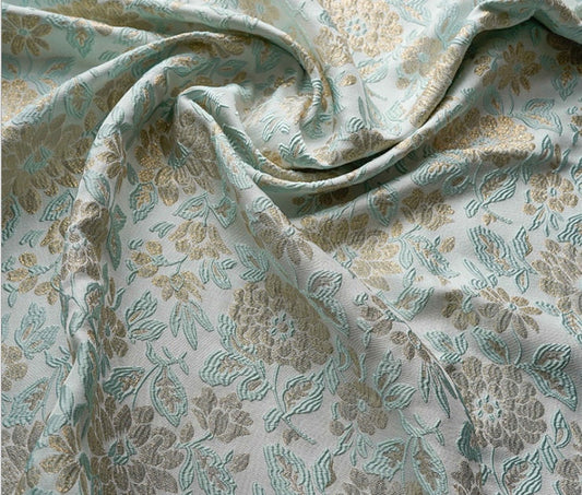 Tissu jacquard floral doré en relief : tissu 3D vert menthe, 140 cm de large