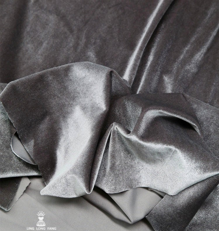 Tissu velours doré extensible : mélange de polyester et d’élasthanne de 155 cm de large