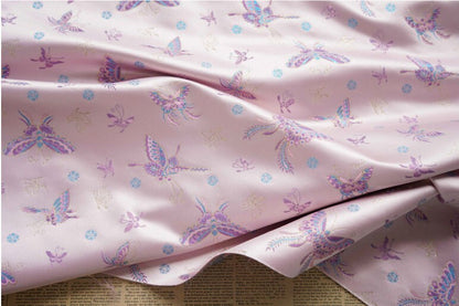 Tissu Butterfly Gold Thread : 150 cm de large, polyester tissé orné