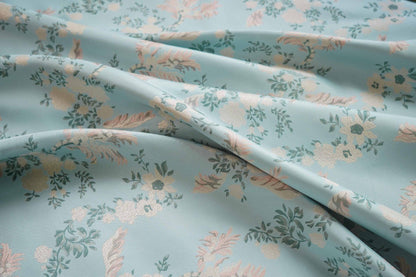 Tissu jacquard à motif floral : Lurex brillant tissé à motif floral 3D, 165 cm de large