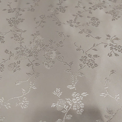 Tissu brocart floral métallisé blanc : rayonne de 114 cm de large, vendu au mètre