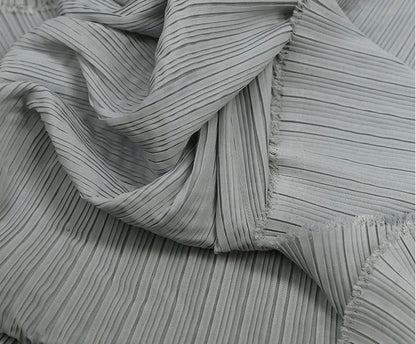 Tissu mousseline plissé : 150 cm de large, texture accordéon