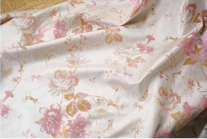 Tissu jacquard à motif floral et fil doré : texture 3D, largeur 160 cm, vendu au mètre