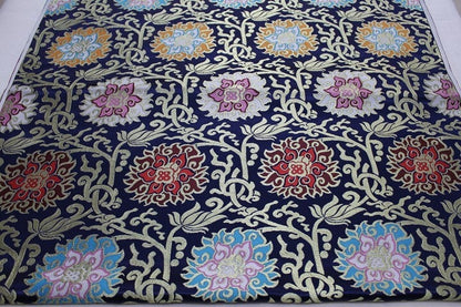 Tissu brocart jacquard à motifs floraux : style sino-mongol (vendu au mètre)
