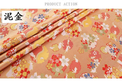 Tissu brocart jacquard Sakura Rabbit : rouge, rose, or, bleu (au mètre)