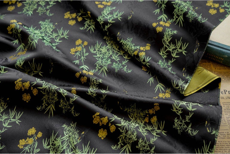 Tissu jacquard bambou oriental : 162,5 cm de large, polyester, matériau de couture