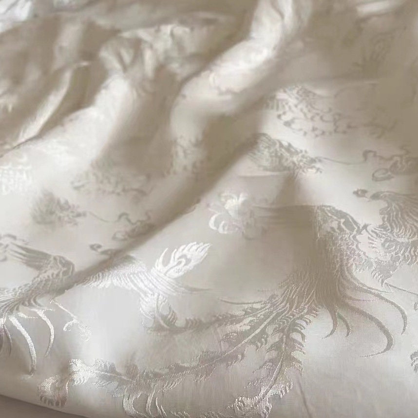Tissu satin damassé jacquard à motif dragon et phénix rose - 150 cm de large