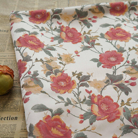 Tissu jacquard à motif floral : lurex tissé aux couleurs vives, 145 cm de large sur 1 mètre de long