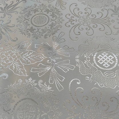 Tissu brocart floral métallisé blanc : rayonne de 114 cm de large, vendu au mètre