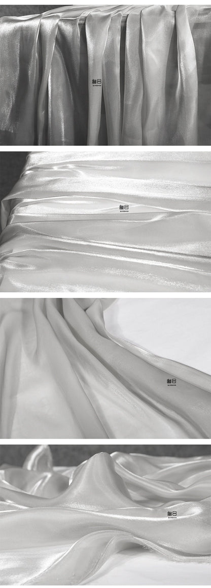 Tissu satiné semi-transparent : matière douce et brillante, 150 cm de large, pour costumes et décoration
