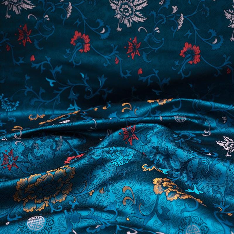 Tissu brocart floral bleu paon : mélange de rayonne, 75 cm de large