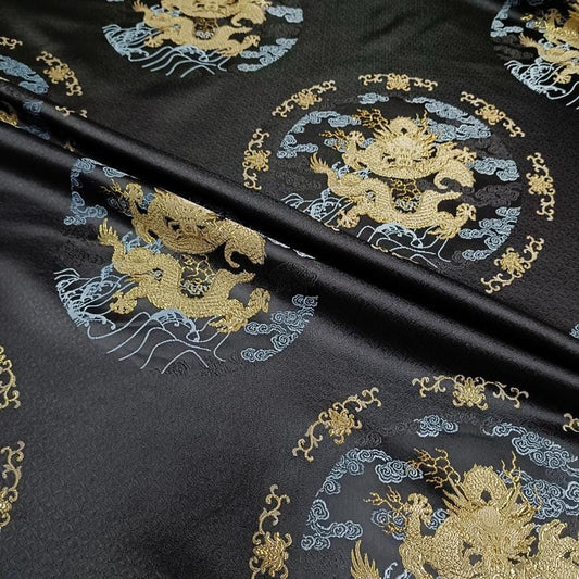 Tissu brocart Dragon : mélange jacquard noir et or, 140 cm de large
