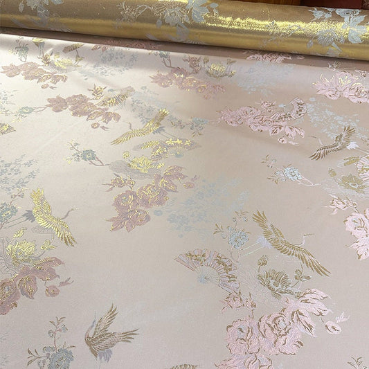Tissu brocart à motif de grues dorées : jacquard rayonne de 140 cm de large (55 po) - Matière à coudre