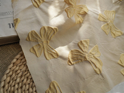 Black Bow Jacquard Fabric: Yarn-Dyed Embossed Upholstery Material, 57" Wide