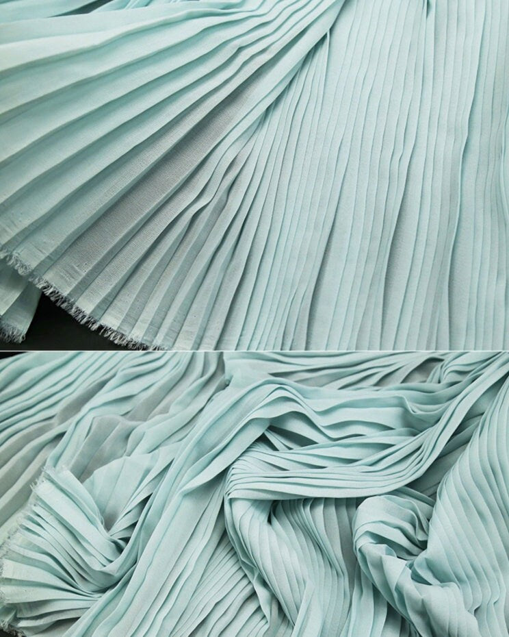 Tissu mousseline plissé : texture crêpe pressée à la main, 150 cm de large