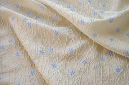 Embossed Beige Polyester Fabric, Blue Flowers, Upholstery & Costume, 56"W