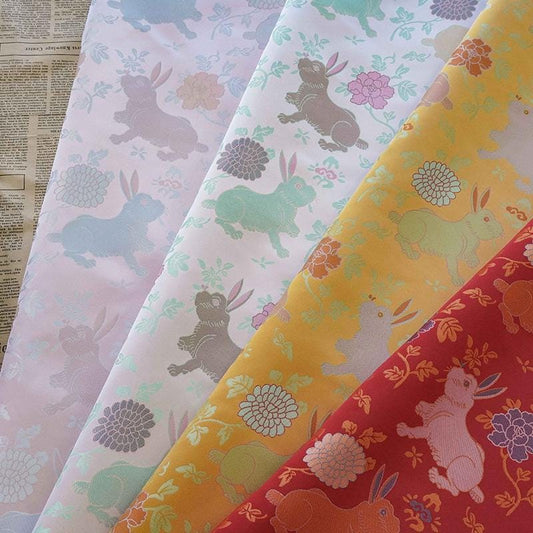 Tissu brocart lapin : 150 cm de large, pour la confection de cheongsams chinois et de robes tibétaines.